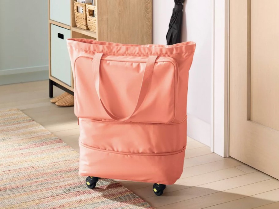 peach large rolling tote in room 